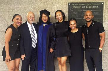 Kirksey-Tarver pictured with her family the day she received her Public Policy Ph.D. from the Nelson Mandela College of Government and Social Sciences at Southern University in Baton Rouge! Continued on page 15 Continued on page 11 Article Image Alt Text