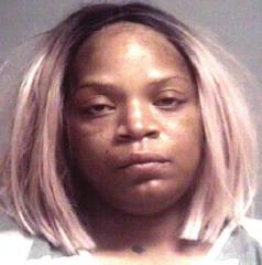 Woman fires handgun at neighbors