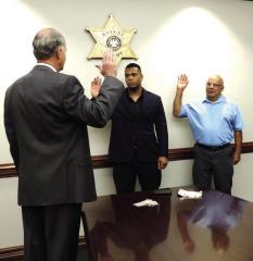 Sheriff swears in deputy, corrections and security officers