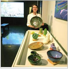 ABOVE: Potter Autumn Tipton with some of her work. AN ARTY AFFAIR