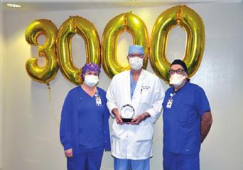 Photo caption: Daryl Marx, MD, is shown with Willis-Knighton Medical Center surgery staffers Heather Clark (left) and Gary Smith. Willis-Knighton’s Daryl Marx, MD, performs 3,000th da Vinci Robotic Surgery