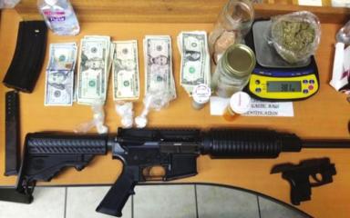 Man rear-ends deputy; guns and drugs found inside vehicle