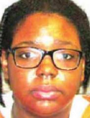 Edwards Woman charged with stabbing shot in leg
