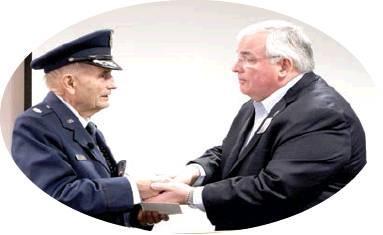Retired Lt. Col. Tells epic WWII life story, receives award from Barksdale