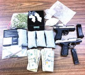  Search warrant yields drugs, firearms after investigation