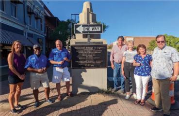 Left: Kathy Malone, DDA board member, Versa Clark and David Jones, representing the RRWC. Right: private donor Will Atkins, Liz Swaine of the DDA, and Dr. George and Sandra Bakowski The plaques are unveiled!