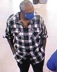 Police seek ID of theft suspect