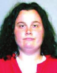 Woodman Woman hits officer with phone