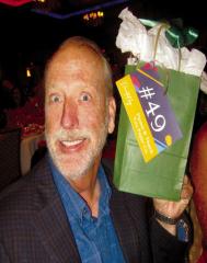 Morris Nichols with a door prize. Here, There and Everywhere