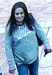 Woman who stole property from hotel victim sought