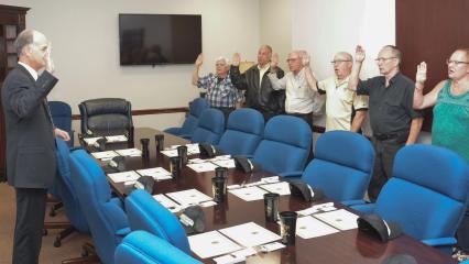 Bossier Sheriff Julian Whittington administered the Oath of Affirmation in a swearing-in ceremony for nine new Posse Members, one woman, and eight men, in the Sheriff’s Conference Room at the Viking Drive Substation in Bossier City, Friday morning. Article Image Alt Text